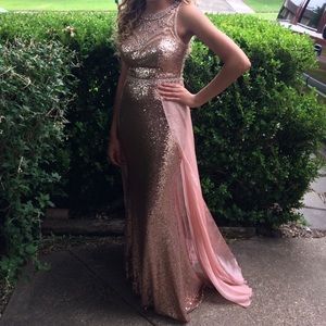 Stunning fully sequined gown in rose gold with sheer sweeping train.